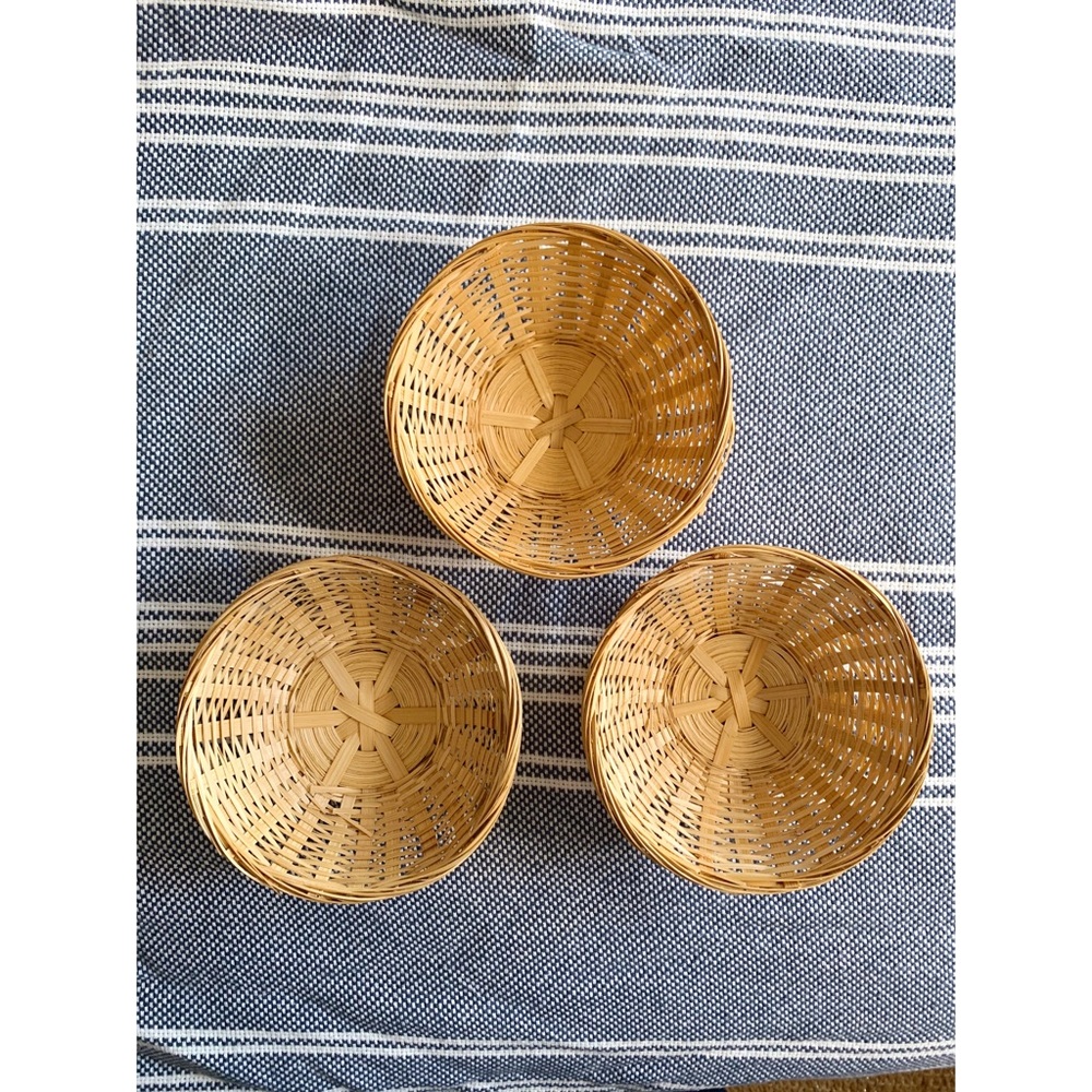 Set of three rattan baskets